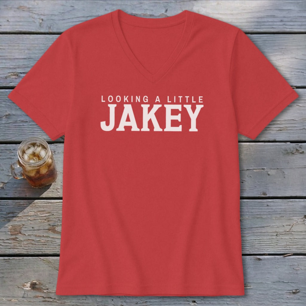 Red v-neck t-shirt with "LOOKING A LITTLE JAKEY" in white text.