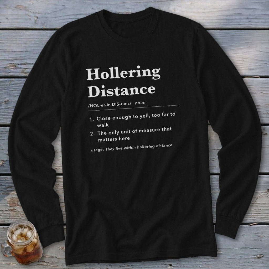 Black long-sleeve shirt with "Hollering Distance" definition printed in white.