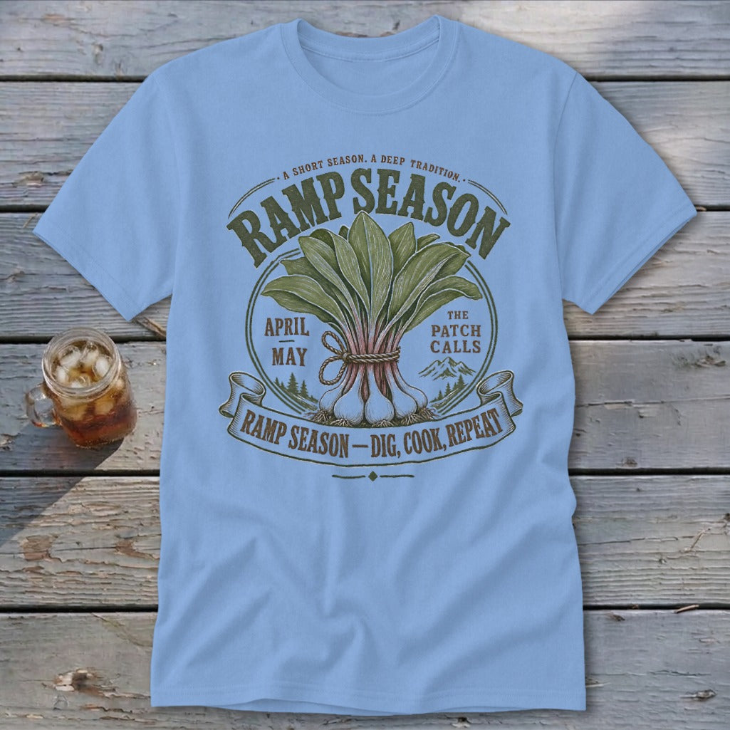 Light blue t-shirt with "Ramp Season Dig, Cook, Repeat" graphic and illustration.