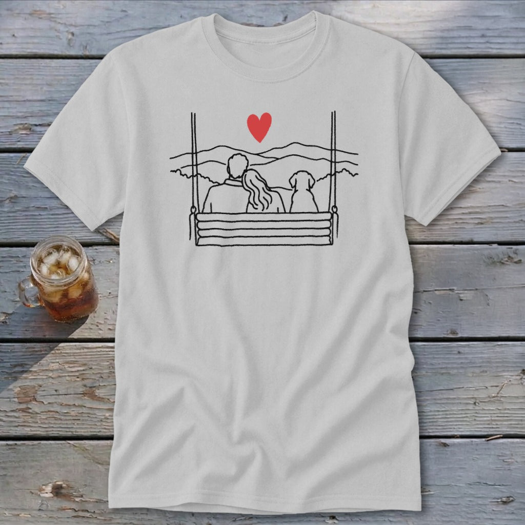 Couple and dog on a swing, overlooking mountains with a red heart.