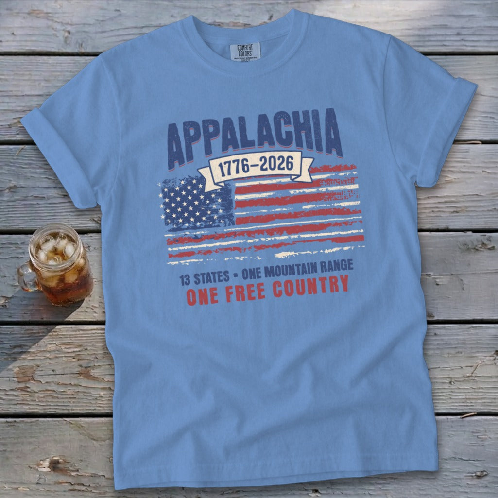 Blue t-shirt with distressed American flag and "Appalachia 1776-2026" text.