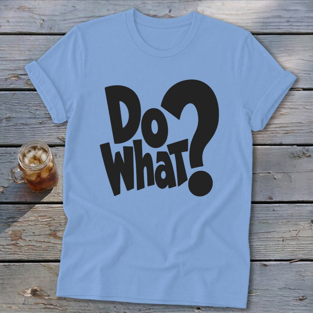 Light blue t-shirt featuring the black text Do What with a question mark on a wooden background.