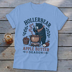 Light blue t-shirt with "Hollerbear Apple Butter Season" text and bear graphic.