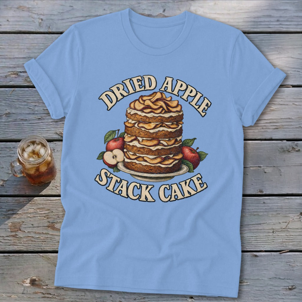 Light blue t-shirt with "Dried Apple Stack Cake" graphic featuring a tall cake and apples.
