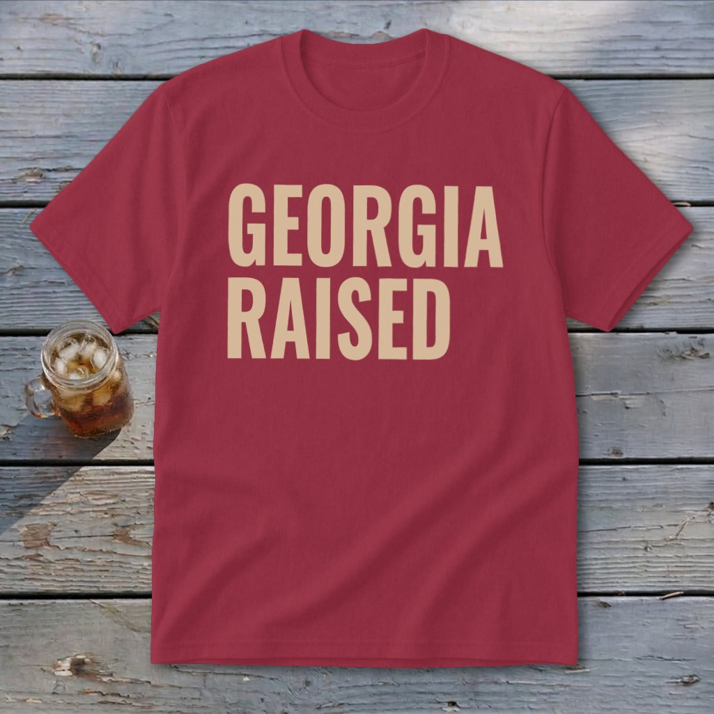 Red t-shirt with "GEORGIA RAISED" text and a glass of iced tea.
