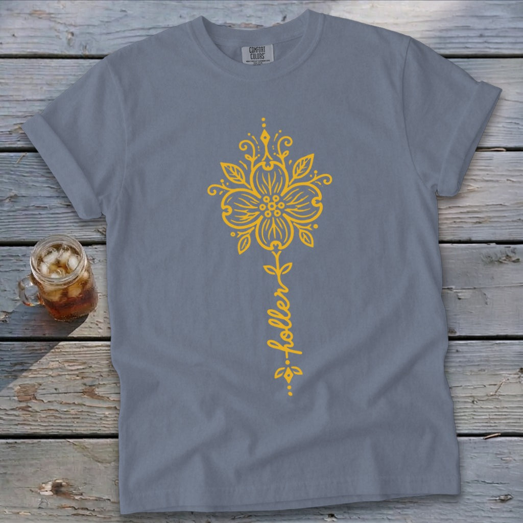 Gray t-shirt with yellow floral design and "holler" text.