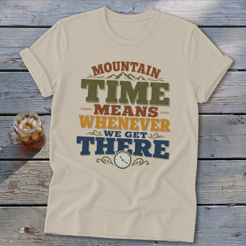 Tan t-shirt with "Mountain Time Means Whenever We Get There" text and clock graphic.