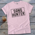 Pink t-shirt with black text reading "SANG HUNTER" in a rectangle.