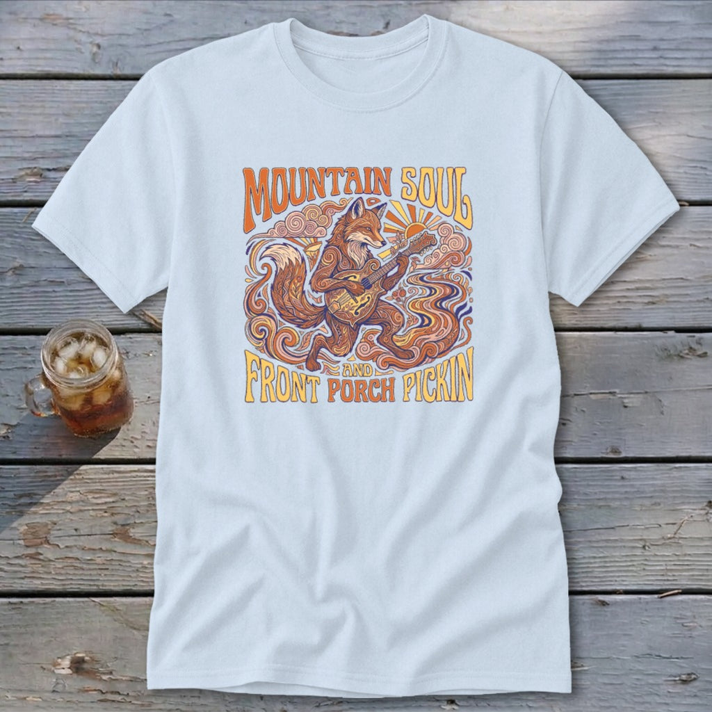 Light blue t-shirt with a fox playing a banjo, "Mountain Soul and Front Porch Pickin'" text.
