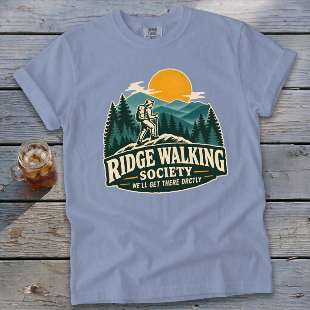 Light blue t-shirt with "Ridge Walking Society" graphic depicting a hiker and mountains.