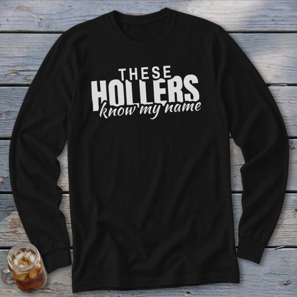 Black long sleeve shirt with white text that reads "THESE HOLLERS know my name".