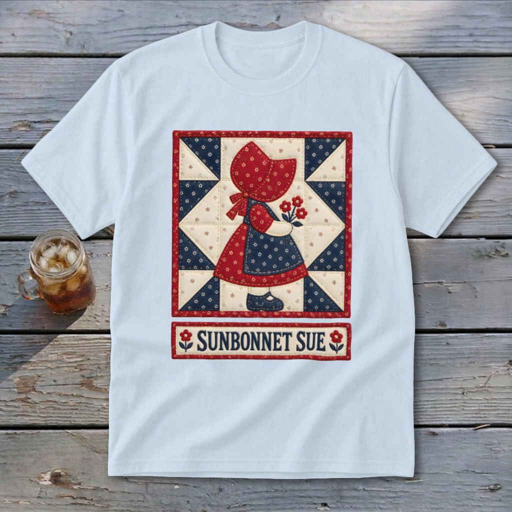 Light blue t-shirt with "Sunbonnet Sue" quilt design of a girl holding flowers.