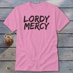 Pink t-shirt with "LORDY MERCY" in black brushstroke text.
