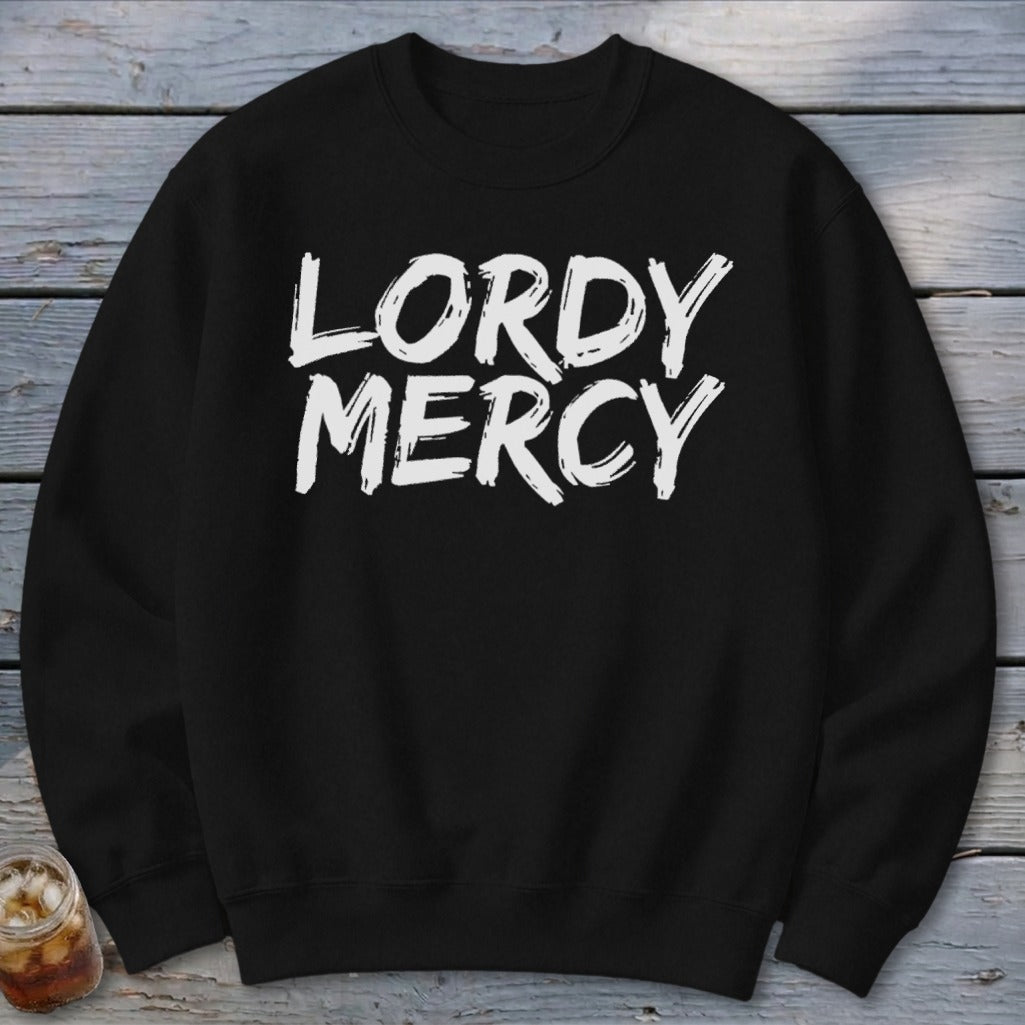 Black crewneck sweatshirt with white "LORDY MERCY" text in distressed brush strokes.