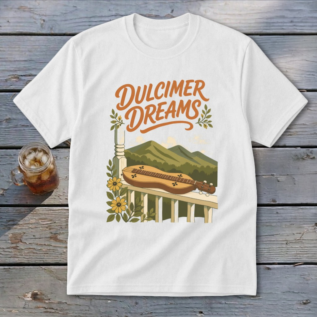 White t-shirt with "Dulcimer Dreams" text, dulcimer on railing, and mountains.