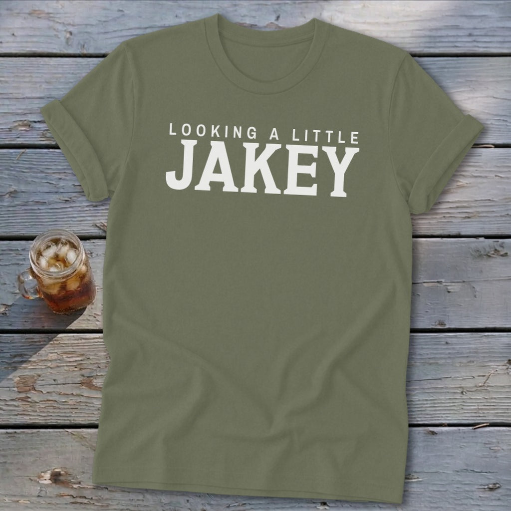 Olive green t-shirt with white text that reads "LOOKING A LITTLE JAKEY".