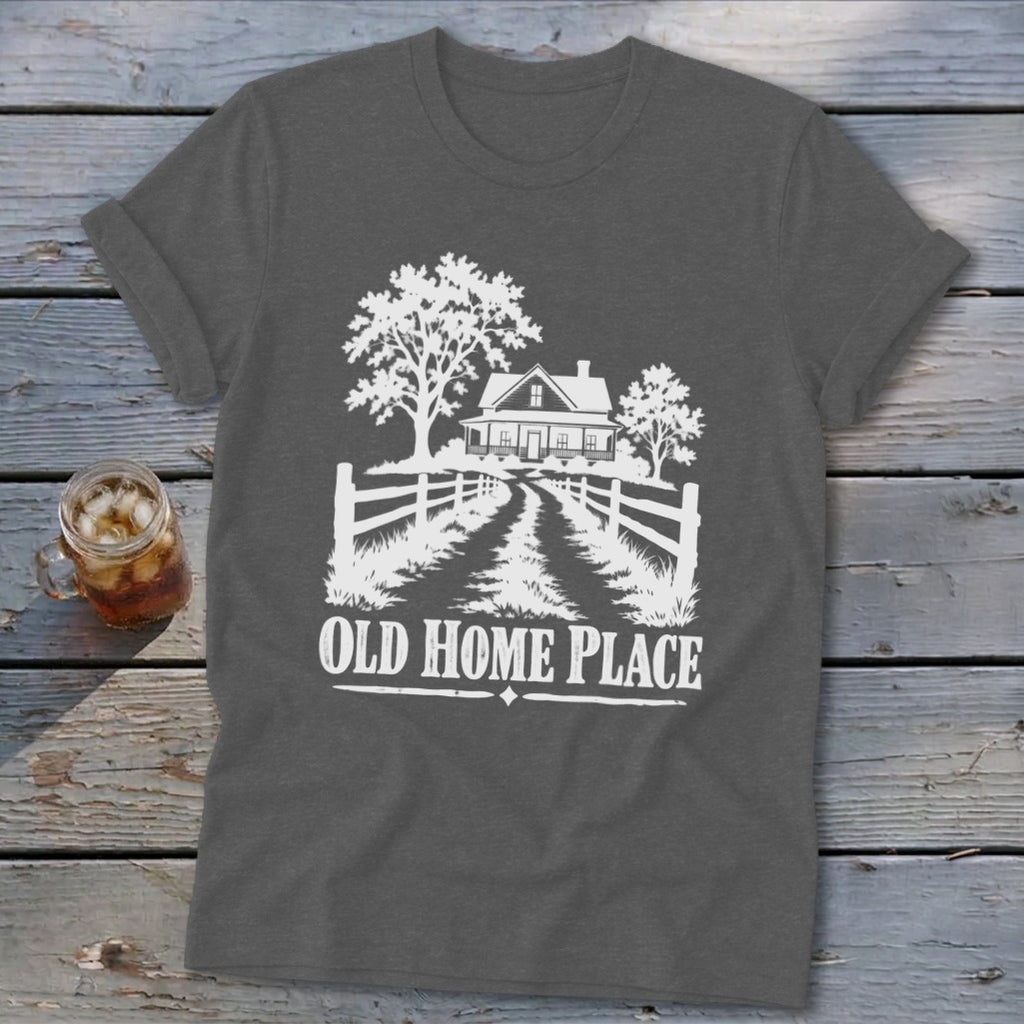 Dark grey t-shirt with white graphic of a house, trees, fence, and text OLD HOME PLACE.