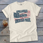 Cream t-shirt with distressed American flag and text "APPALACHIAN RAISED AMERICAN MADE".