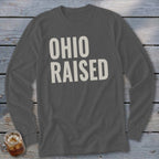 Gray long-sleeve shirt with "OHIO RAISED" printed in white.