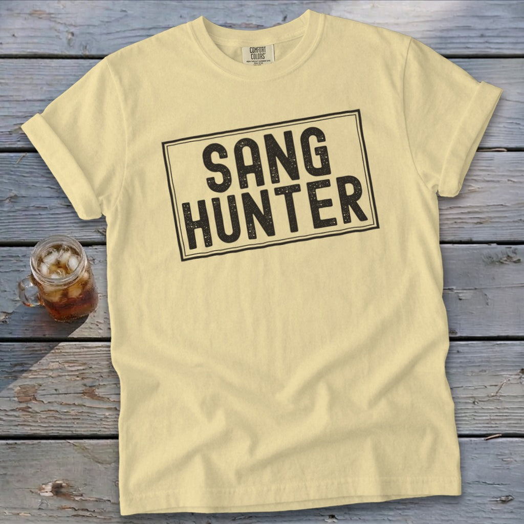 Light yellow t-shirt with "SANG HUNTER" graphic in a black box.