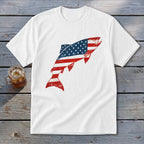 A white short-sleeved t-shirt featuring a leaping fish graphic patterned with the American flag.