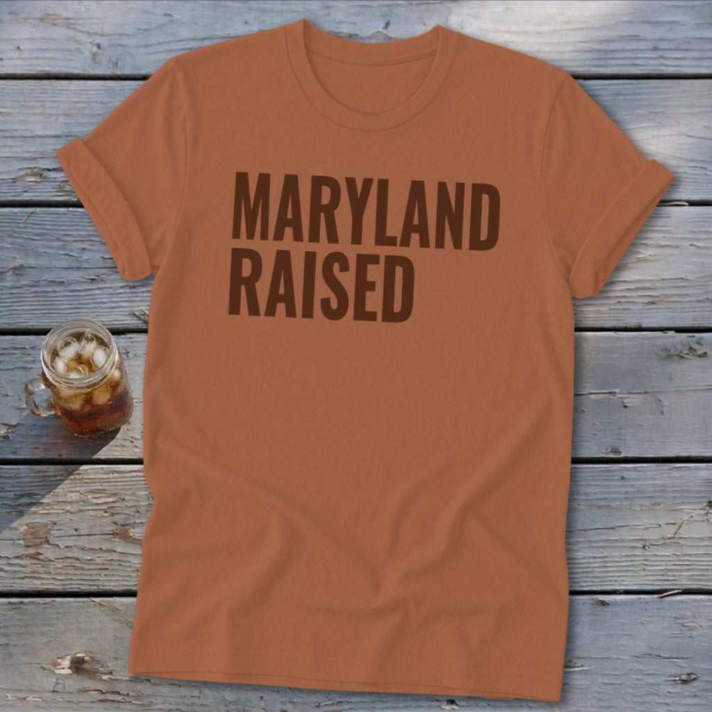 Orange t-shirt with "Maryland Raised" text and a glass of iced tea.
