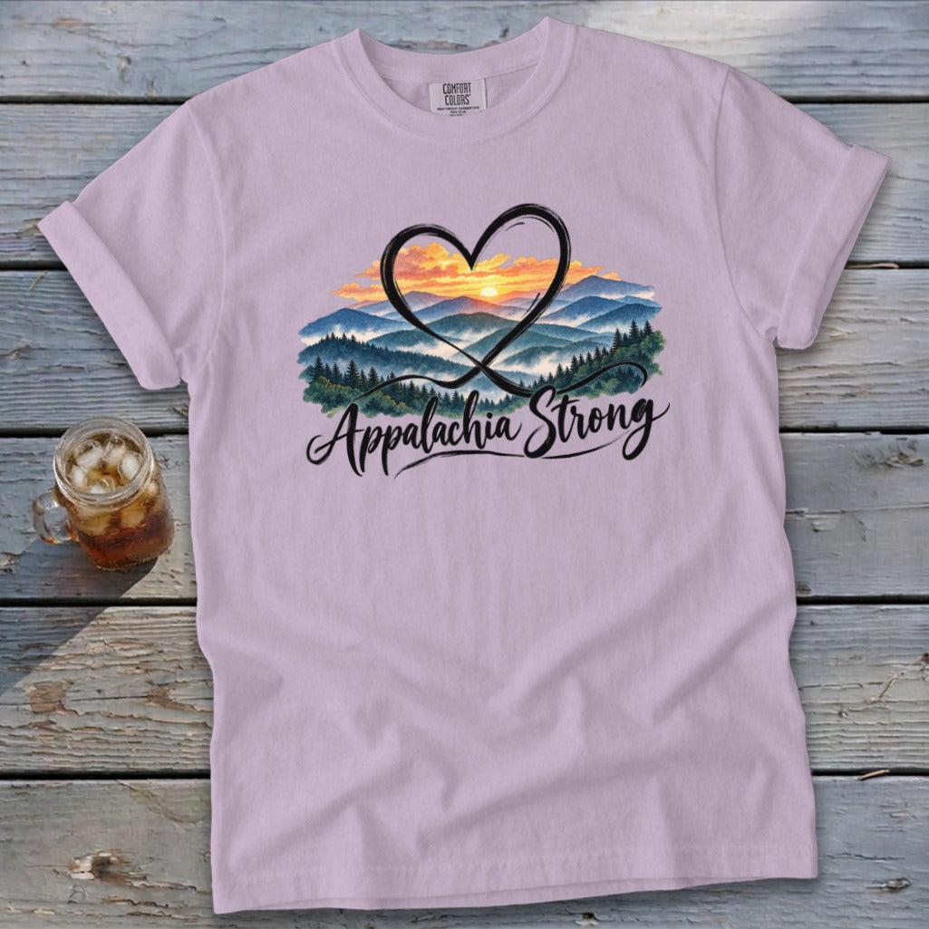 Lavender t-shirt with "Appalachia Strong" text and mountain sunset graphic.