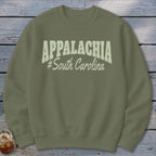 Olive green sweatshirt with "APPALACHIA #South Carolina" text in cream.