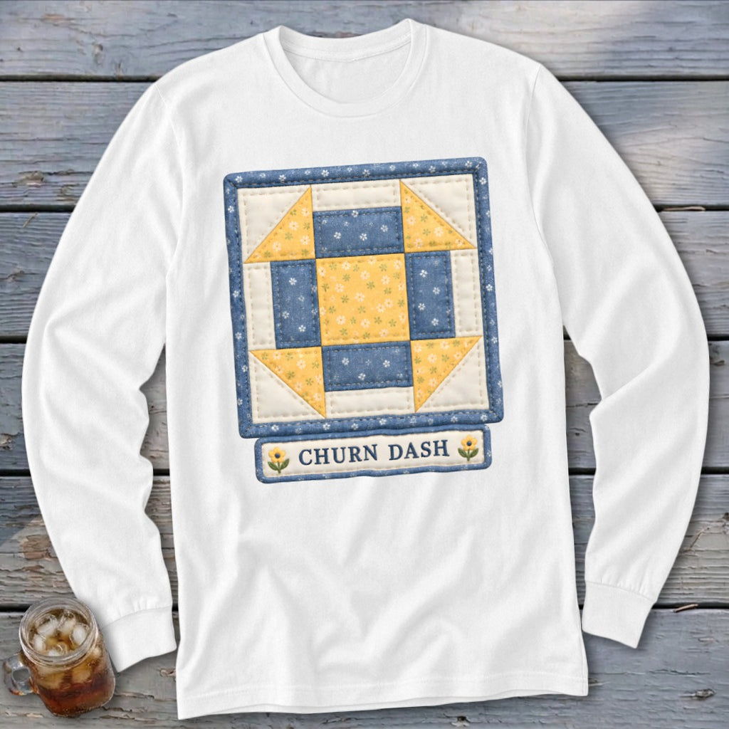 White long-sleeve shirt with "Churn Dash" quilt block design.