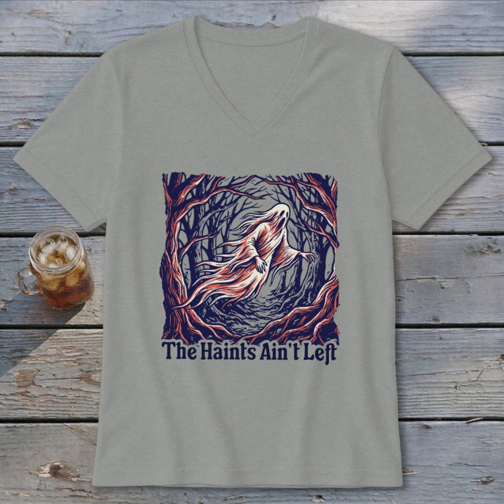 T-shirt with ghost in a spooky forest and text "The Haints Ain't Left".