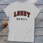 White t-shirt with "LORDY MERCY" text in a collegiate font.