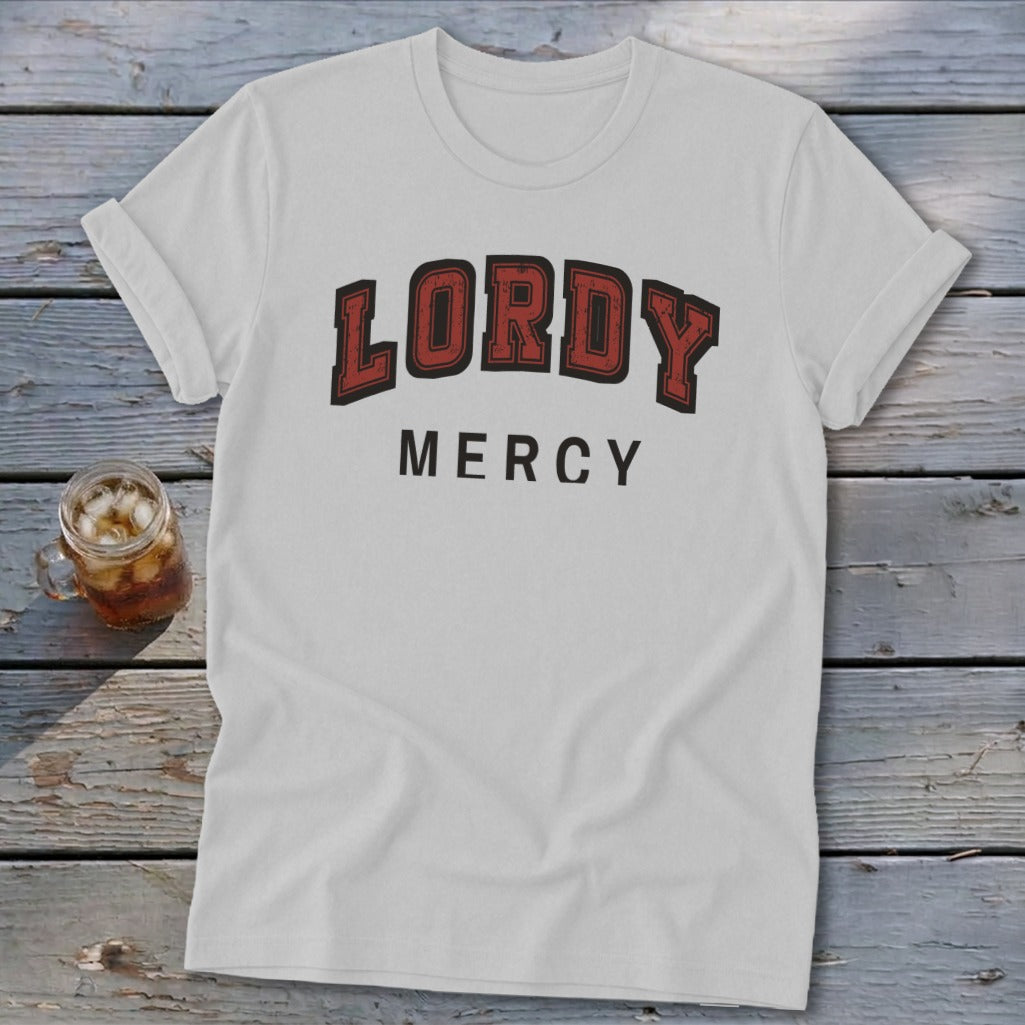 White t-shirt with "LORDY MERCY" text in a collegiate font.