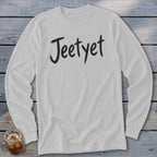 White long-sleeved t-shirt with "Jeetyet" in black brushstroke font.