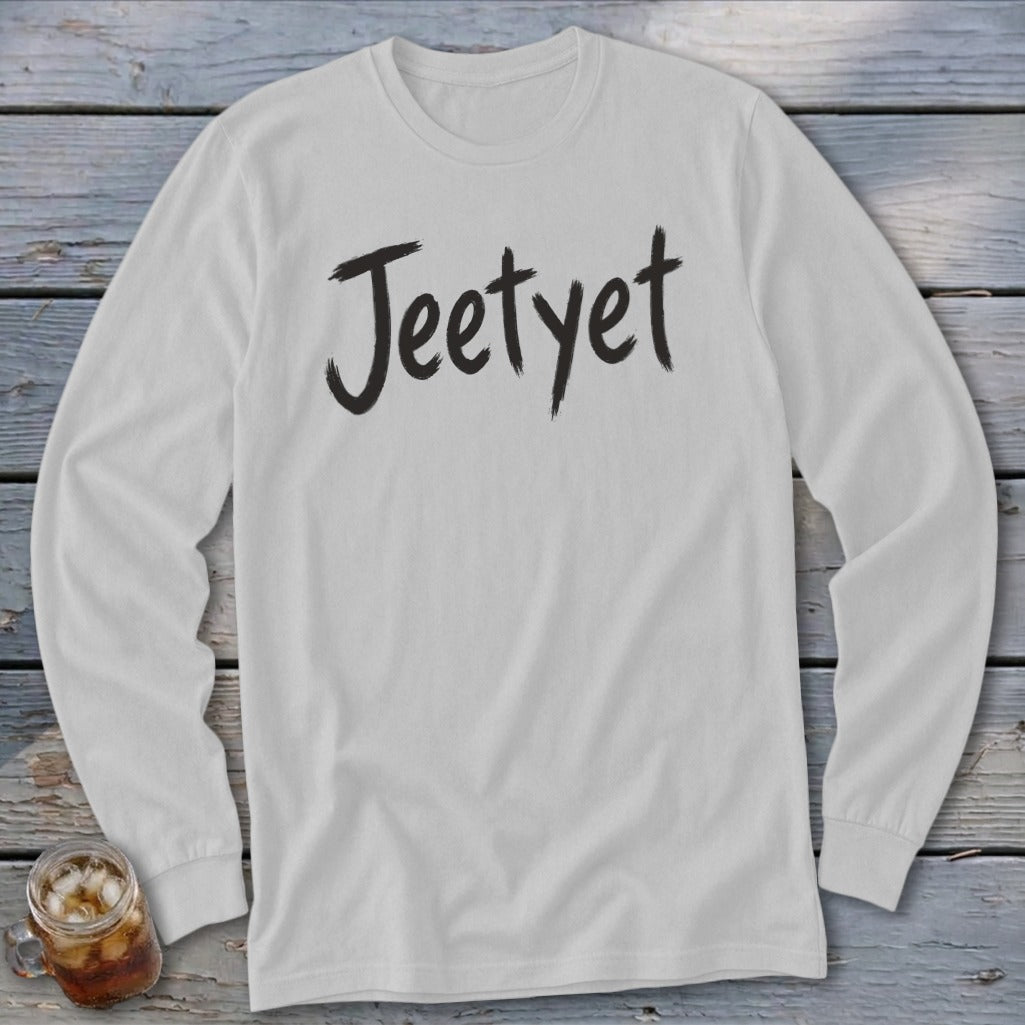White long-sleeved t-shirt with "Jeetyet" in black brushstroke font.