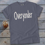 Dark slate blue t-shirt with "Overyonder" in white text, on a wooden surface.