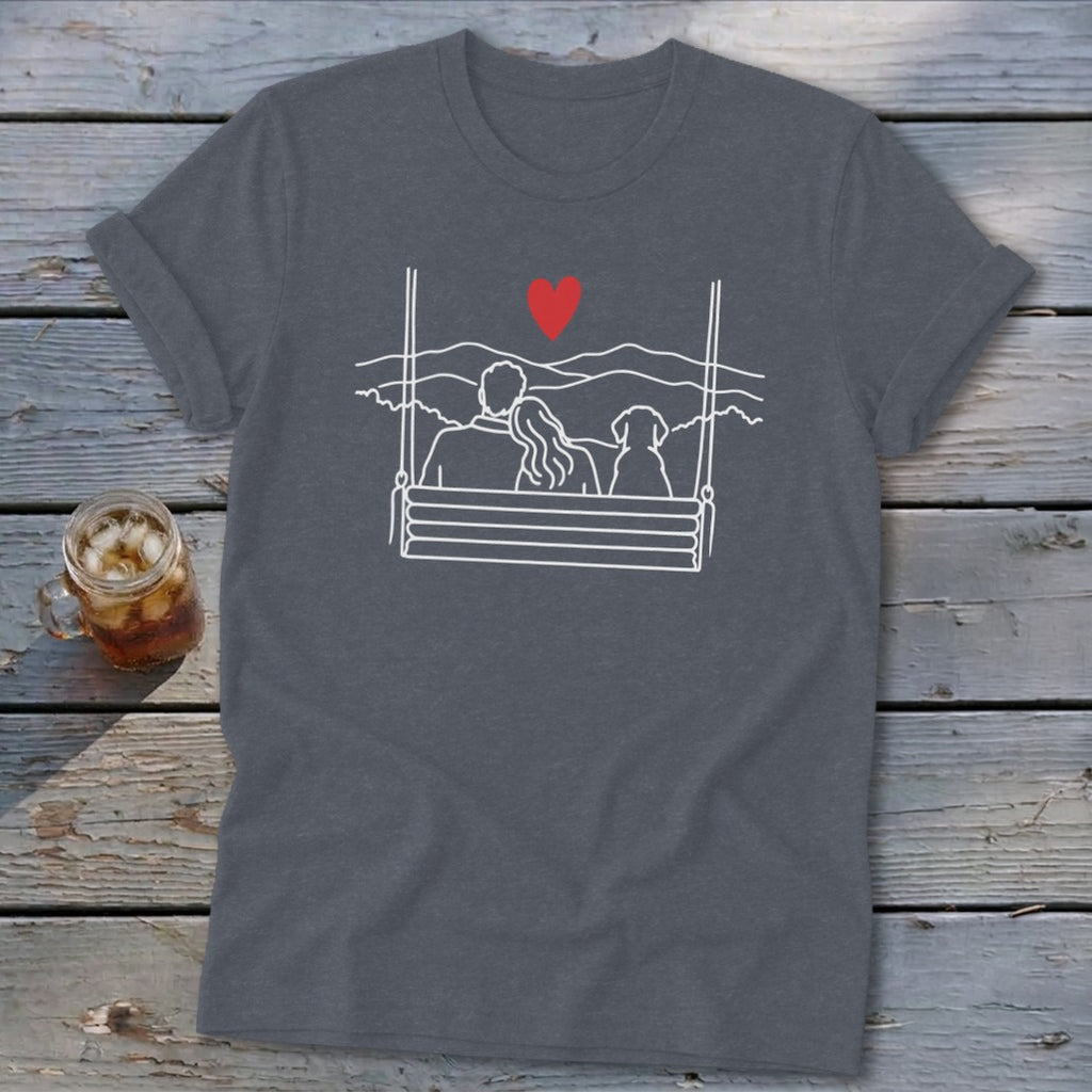 Couple and dog on a swing with heart and landscape design on a gray t-shirt.