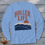 Light blue long-sleeve t-shirt with red "HOLLER LIFE" text above a mountain and sun graphic.