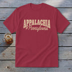 Maroon t-shirt with "APPALACHIA #Pennsylvania" text and a glass of iced tea.