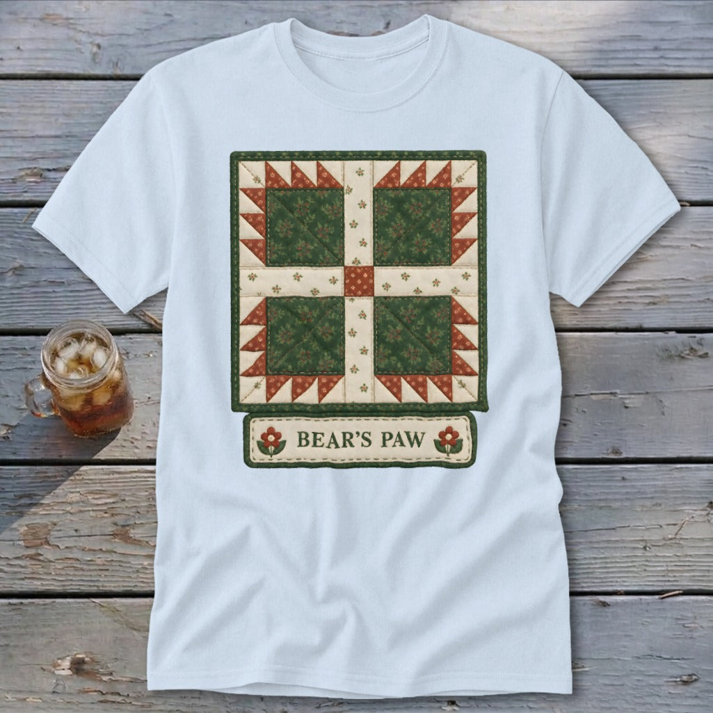 Light blue t-shirt featuring a "Bear's Paw" quilt block design with floral accents.