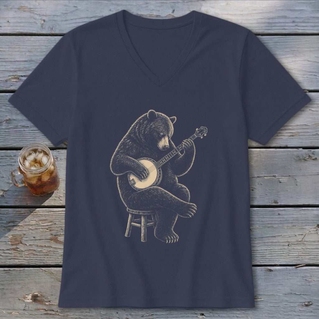 Dark blue v-neck t-shirt featuring a black bear playing a banjo on a stool.