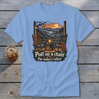 Light blue t-shirt with porch scene, rocking chairs, pumpkin, and text: Pull up a chair, The holler's talkin'.