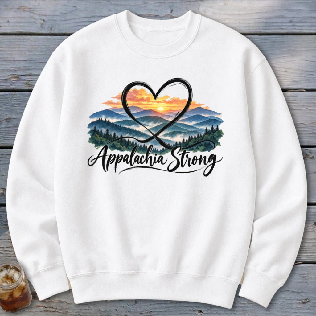 White sweatshirt with a heart-shaped graphic of rolling mountains and "Appalachia Strong" text.