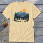 Cream t-shirt with mountain sunrise graphic and "Ridge Runner Morning" text.