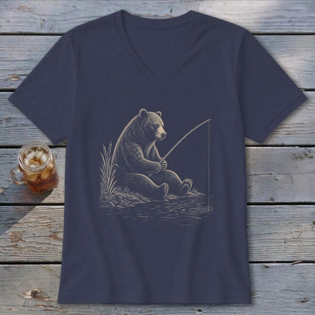 T-shirt with a detailed sketch of a bear fishing by a lake.