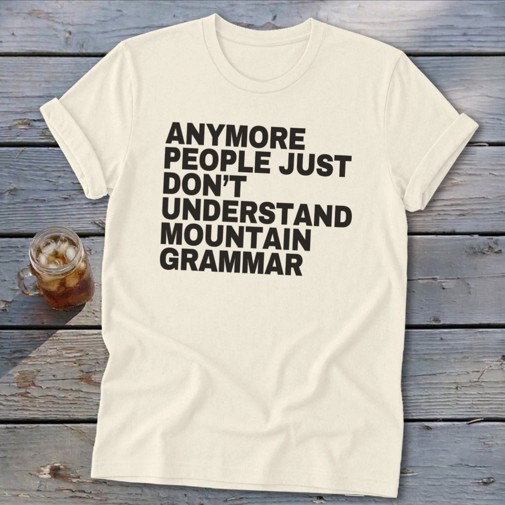 Cream t-shirt with black text reading "Anymore people just don't understand mountain grammar".