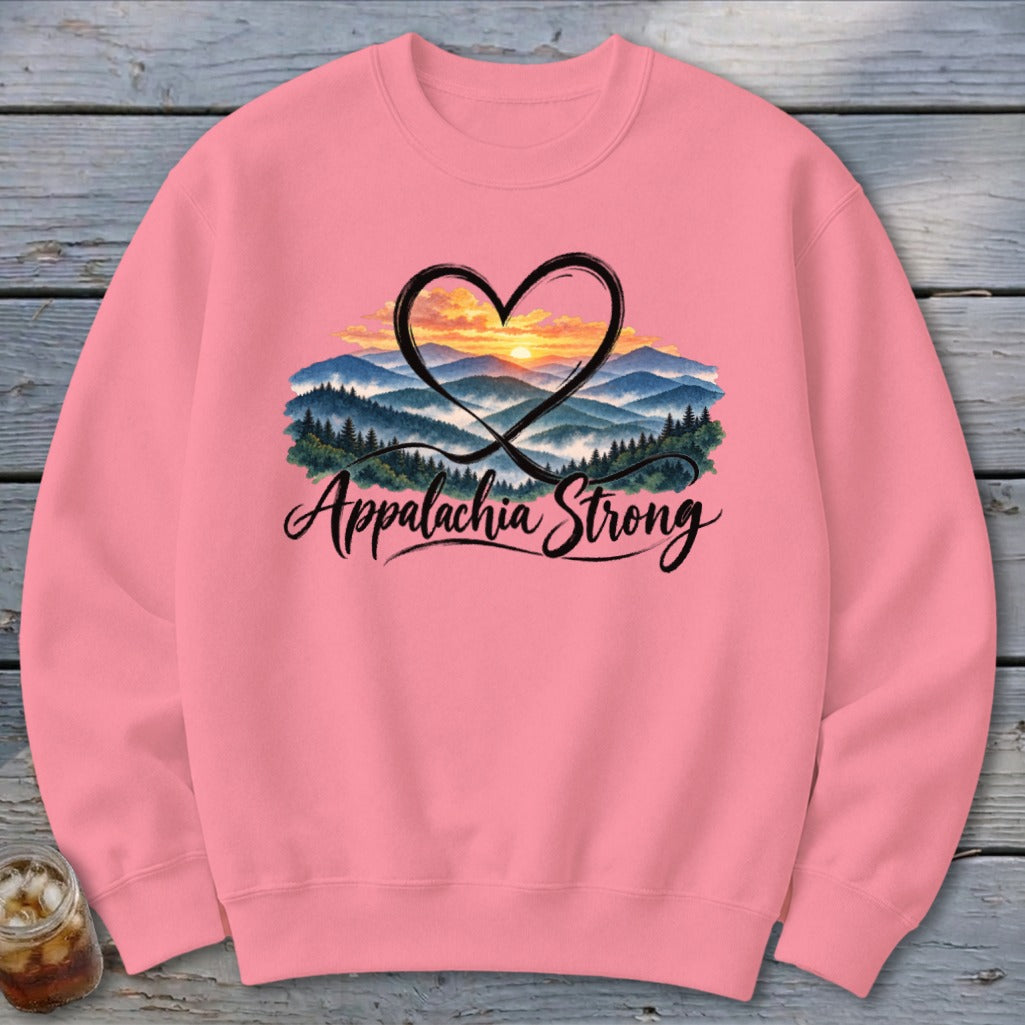 Pink sweatshirt with heart, mountains, sunset, and "Appalachia Strong" text.