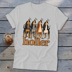 White t-shirt with cartoon hounds howling and the word "holler"