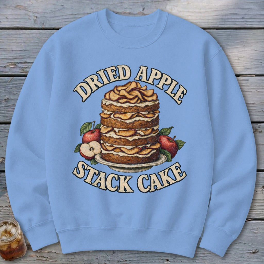 Light blue sweatshirt with "Dried Apple Stack Cake" text and cake illustration.
