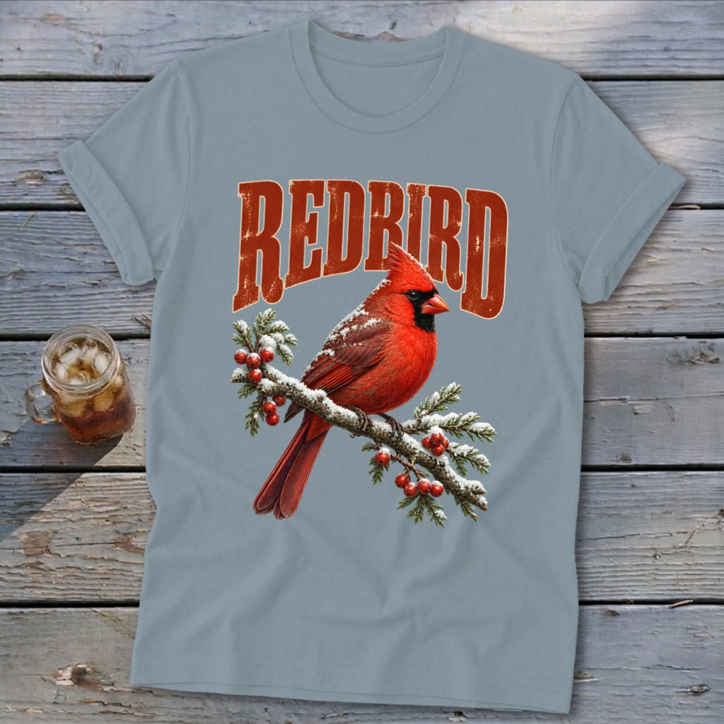 Gray t-shirt featuring a graphic of a red cardinal on a snowy branch with the text "REDBIRD".
