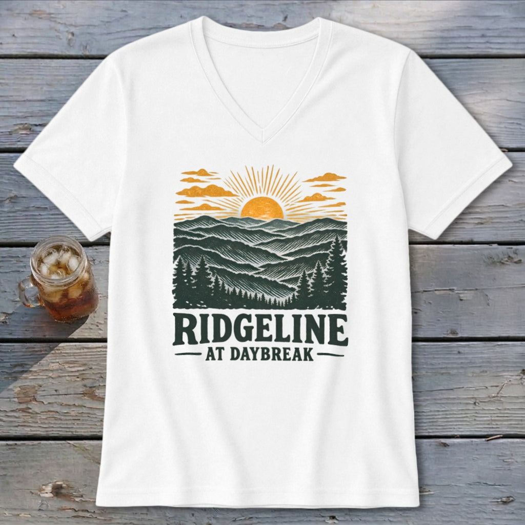 White t-shirt with "RIDGELINE AT DAYBREAK" mountain sunrise graphic.